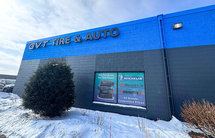 GVT Tire and Auto shop exterior with tire brands.