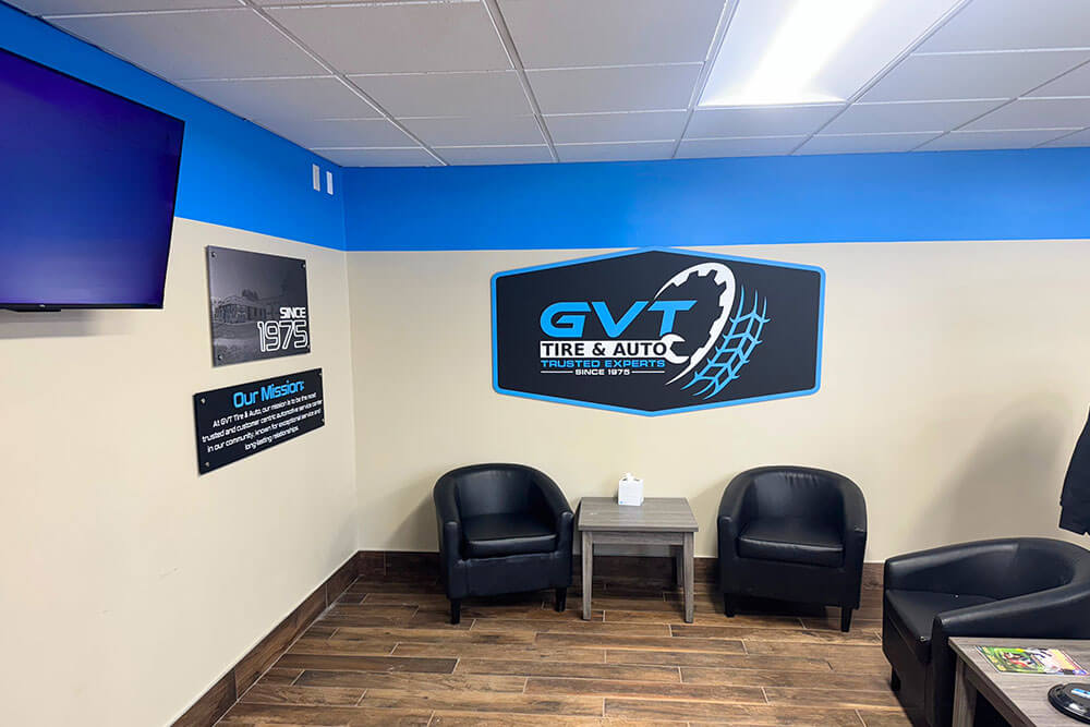 GVT Tire and Auto waiting area with signage.